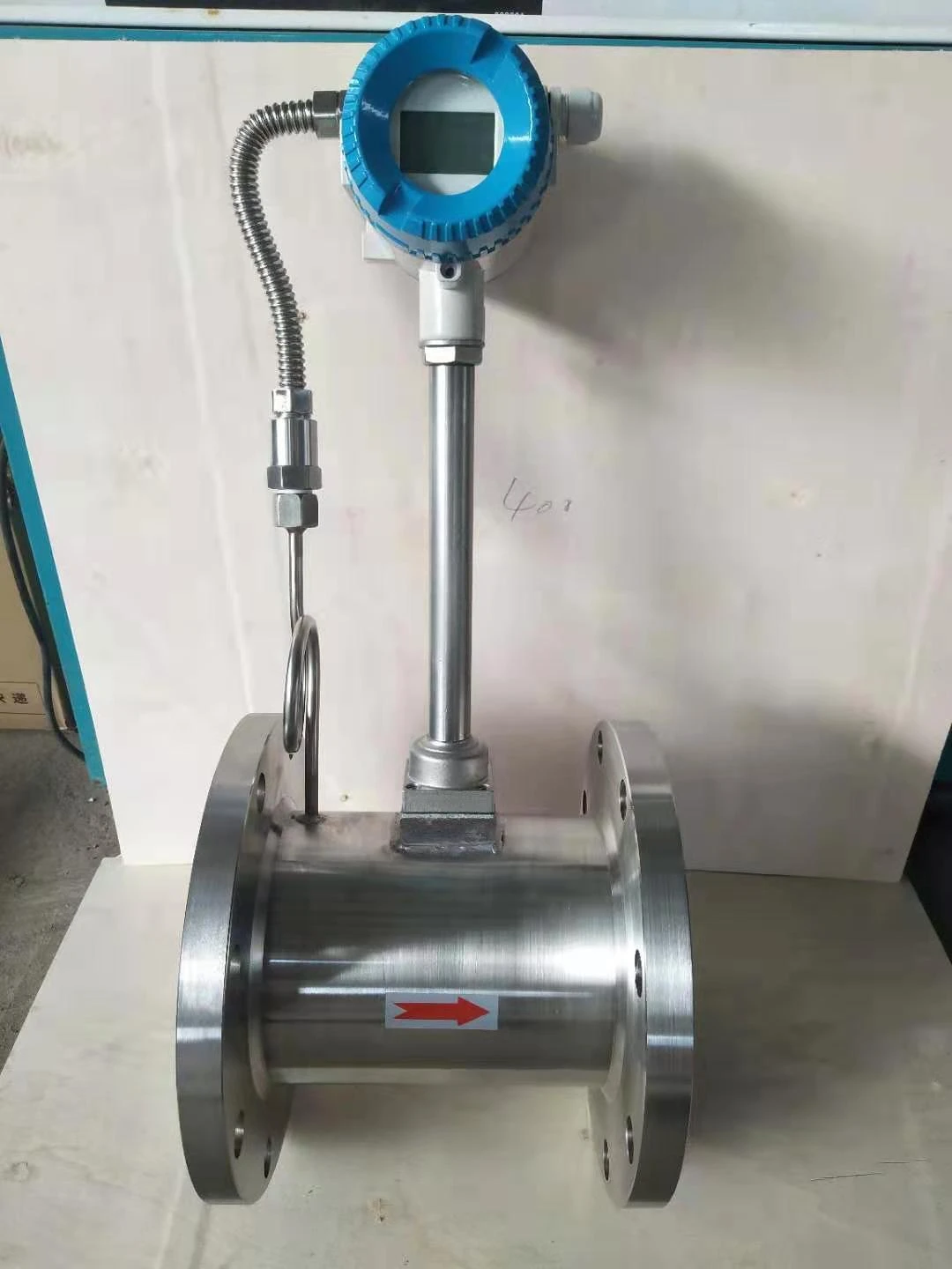 Temperature and pressure compensated vortex flowmeter